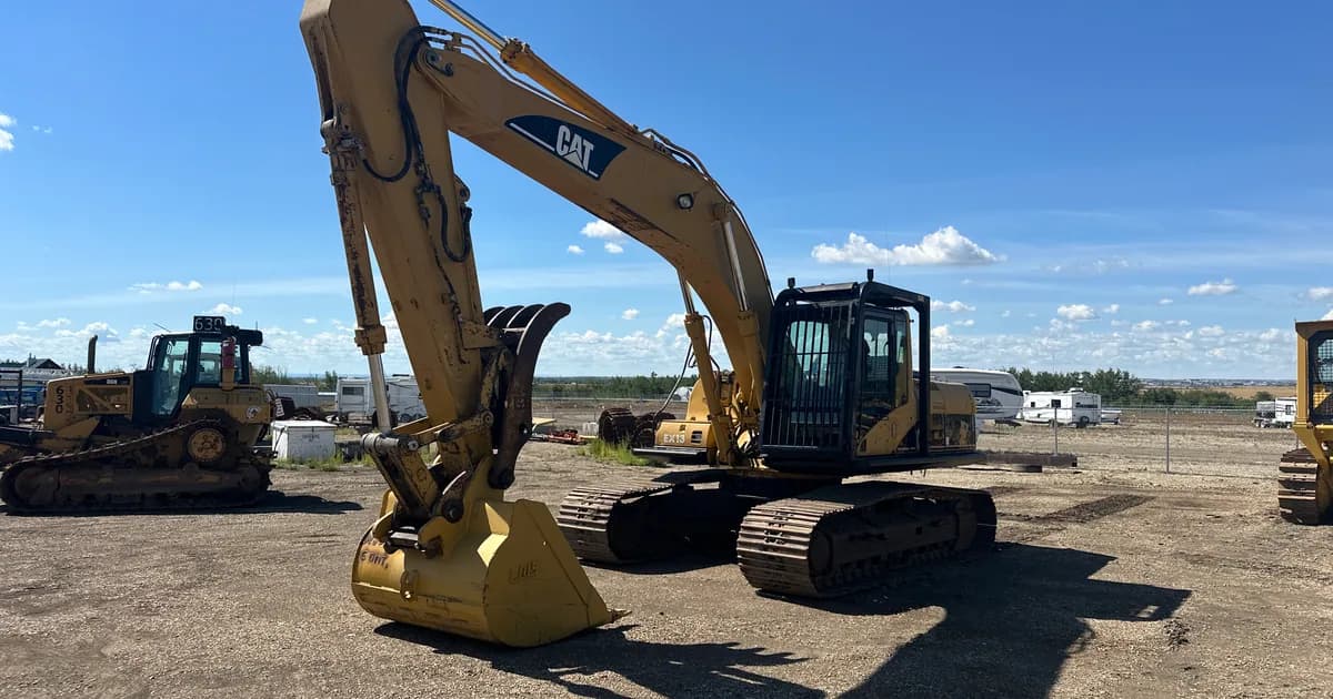 2006 Cat 325CL excavator — the kind of older high-hour machine that triggers lender hour limits