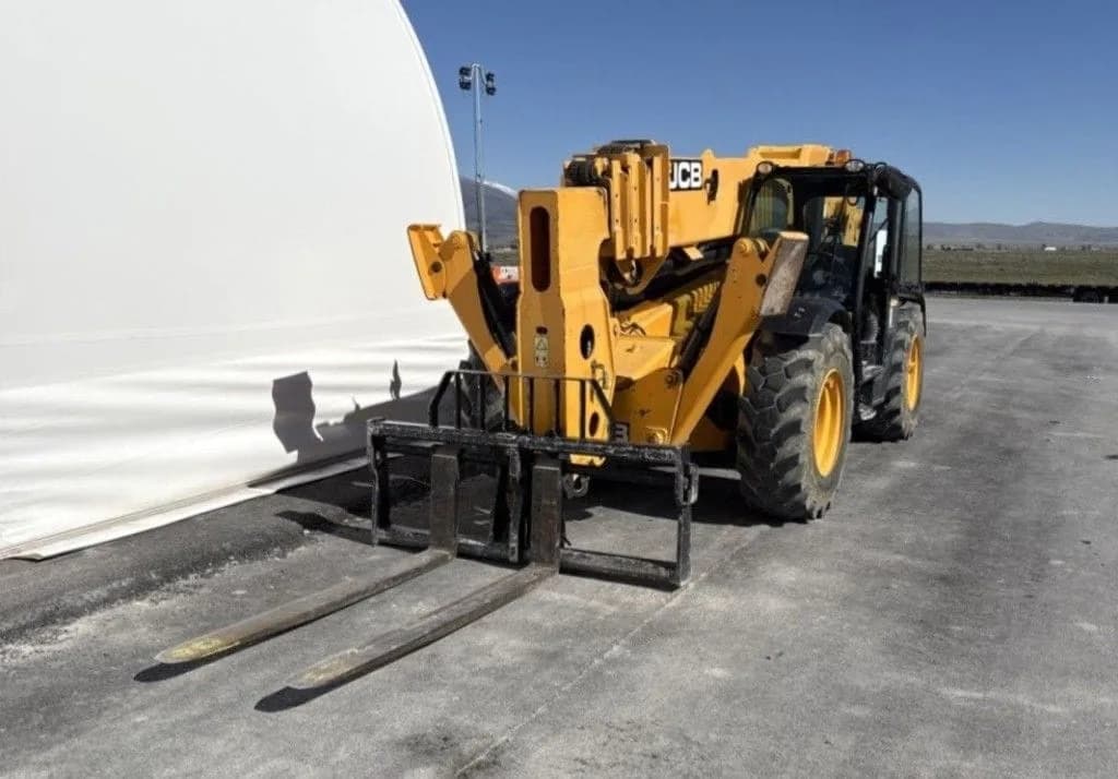 2019 JCB 510-56 Loadall telehandler on a dealer lot — the telescoping boom and forks that tell a used telehandler's real story, more than the hour meter