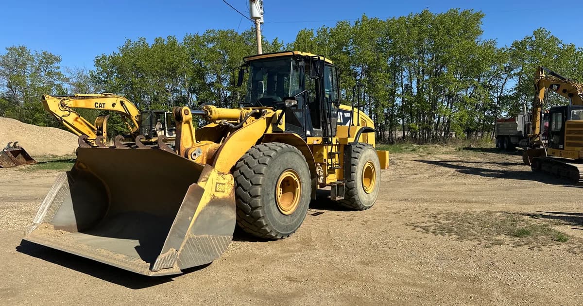 Cat 966H wheel loader — the kind of collateral a lender repossesses after default